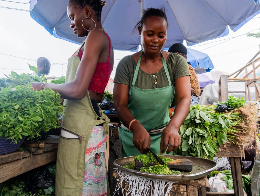 Vegetable sellers 2 scaled Nigerian Women doing Business in the Market